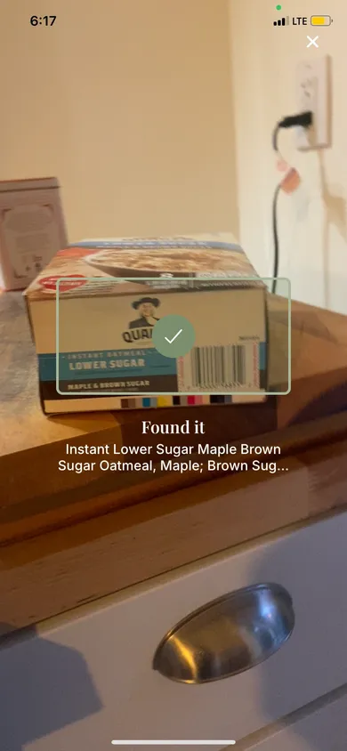 Scanning a box of Quaker Lower Sugar instant oatmeal: the app confirms “Found it” with the product name